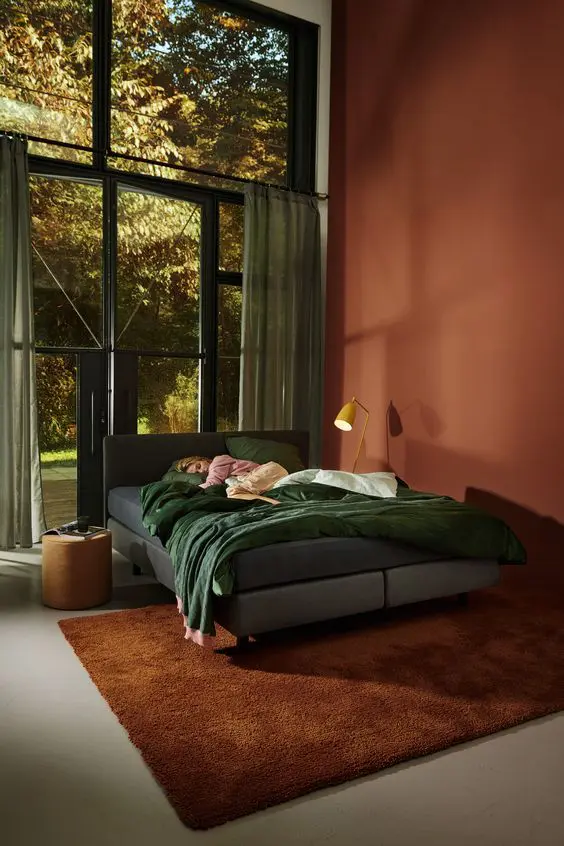 Bold Bedroom with Jewel-Tone Bedding and Leather Accents
