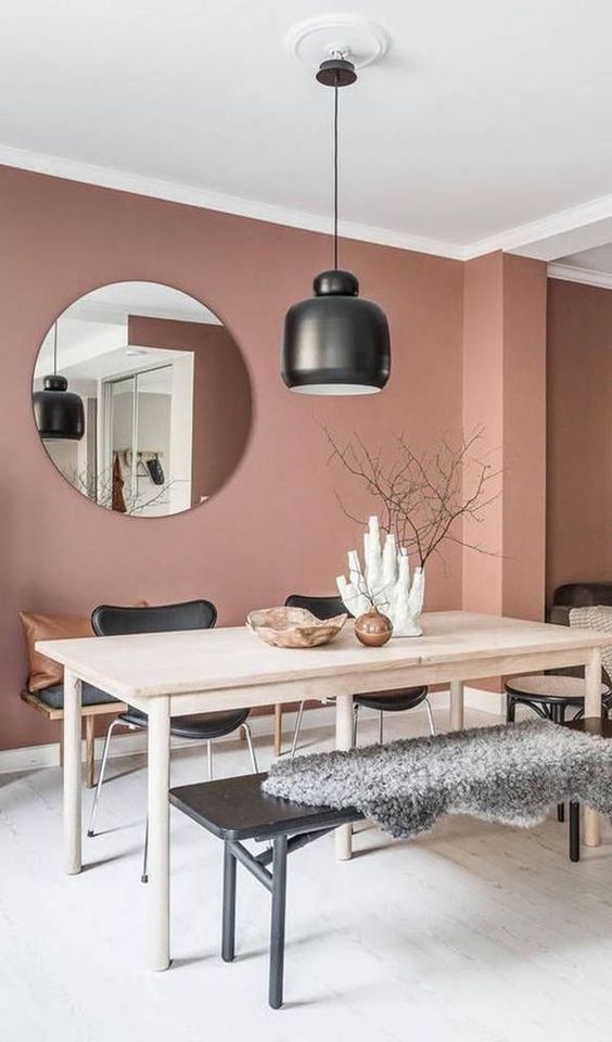 Scandinavian Dining Room with Terracotta and Black Accents