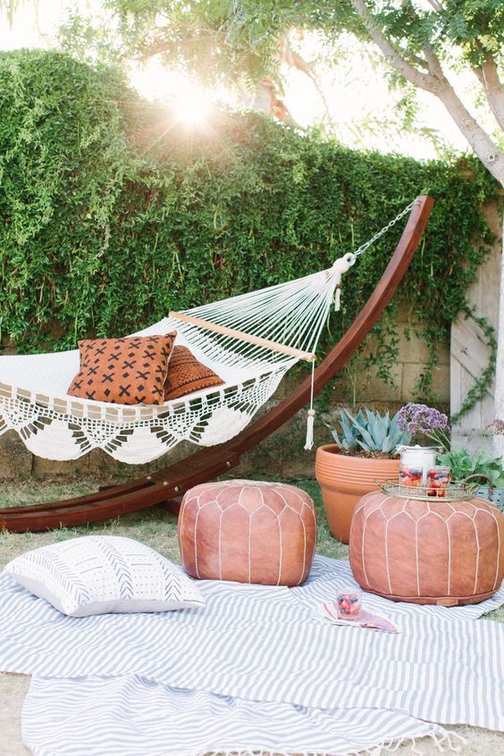 Bohemian backyard with a lush living wall and textured decor