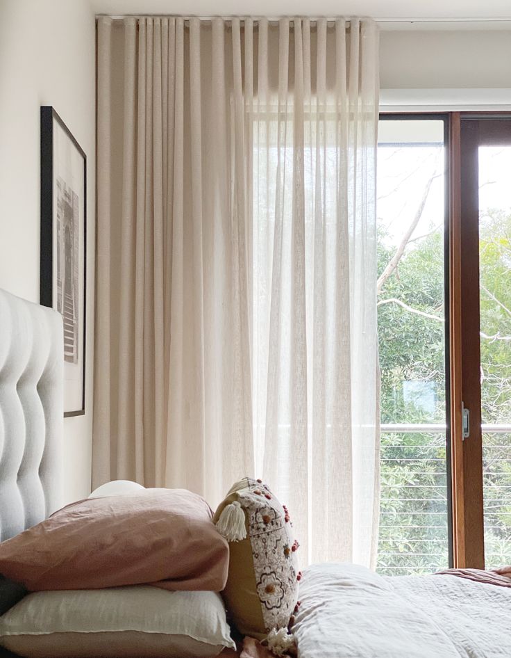 Neutral Curtains with a Contrasting Finish in Cozy Bedroom