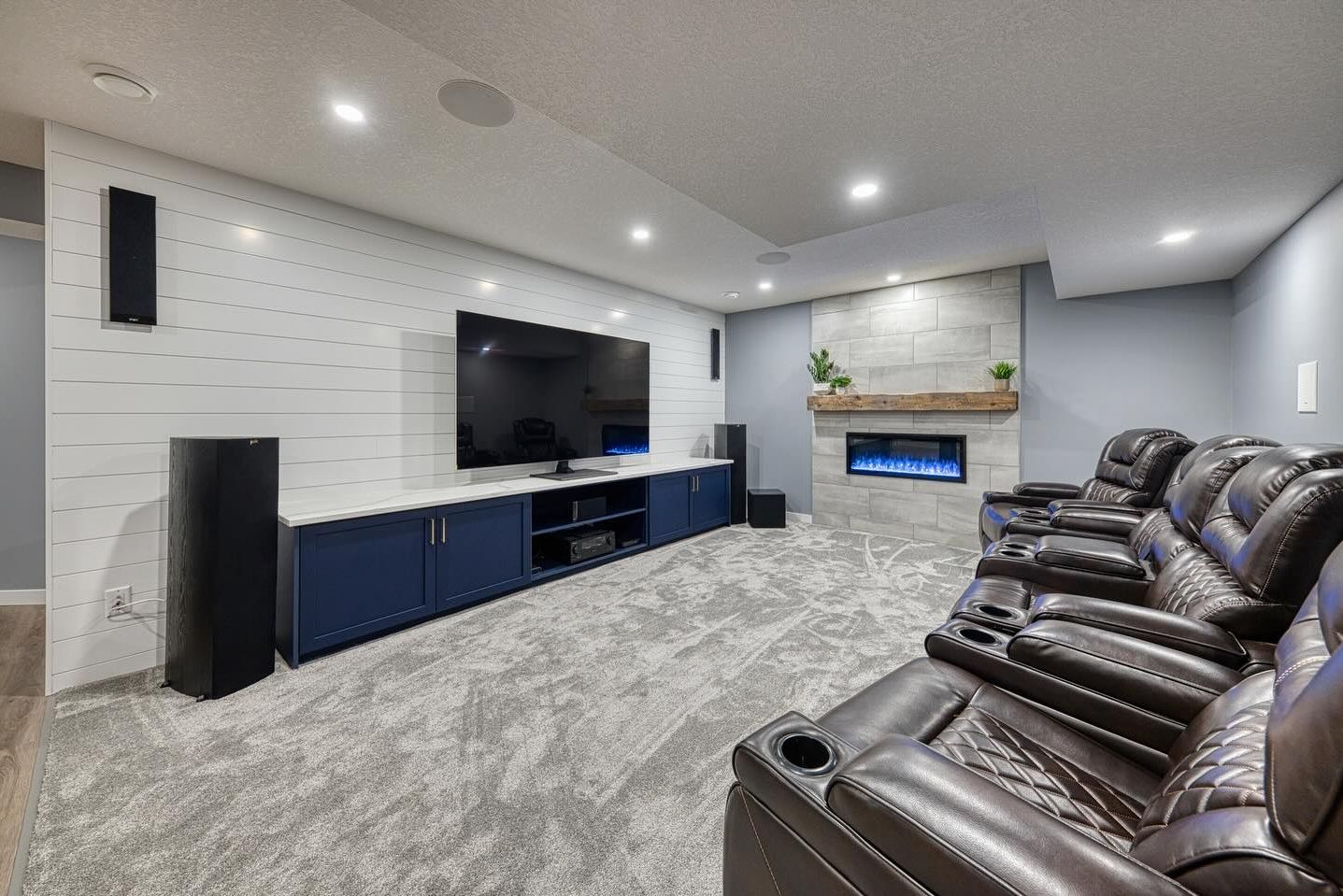 Modern Minimalist Basement with Pops of Warmth