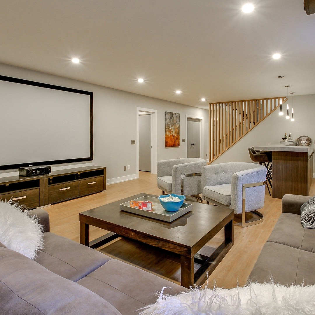 Luxurious Finished Basement with a Sophisticated Palette