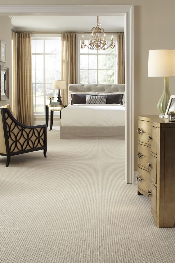 Bedroom with Creamy Plush Carpet and Neutral Palette