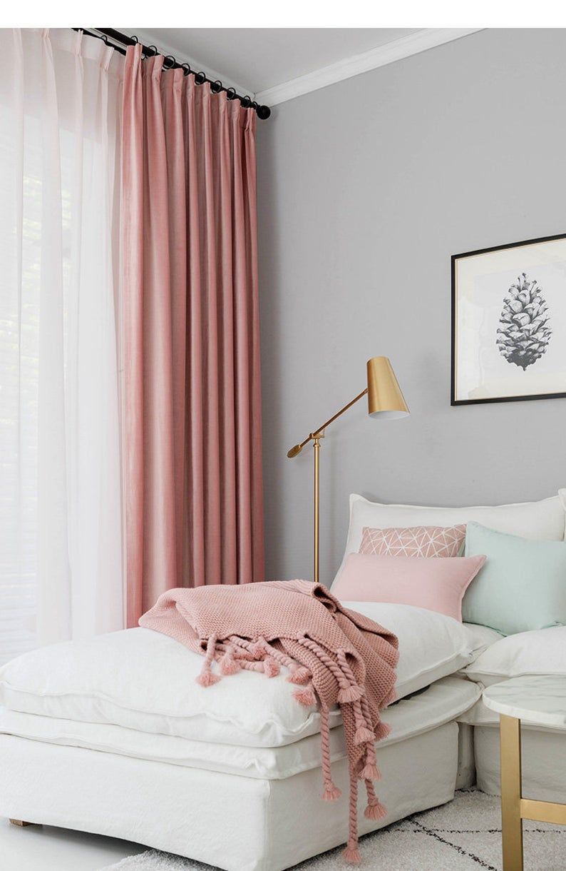Bedroom with Creamy White Drapes for a Bright and Romantic Feel