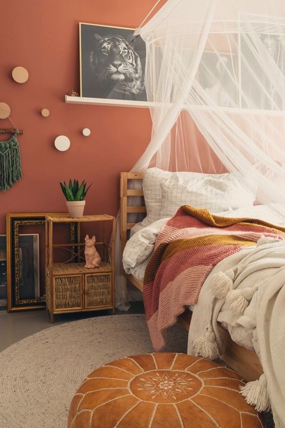 Eclectic Bedroom with Terracotta Wall and Canopy Bed