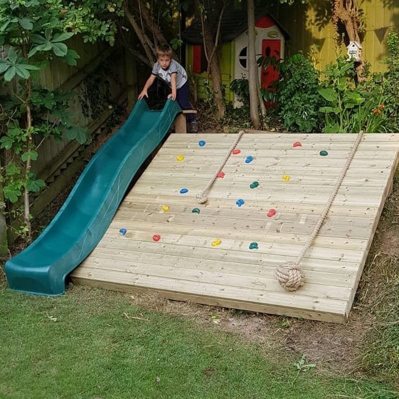 Vibrant Backyard Playground with Hammocks