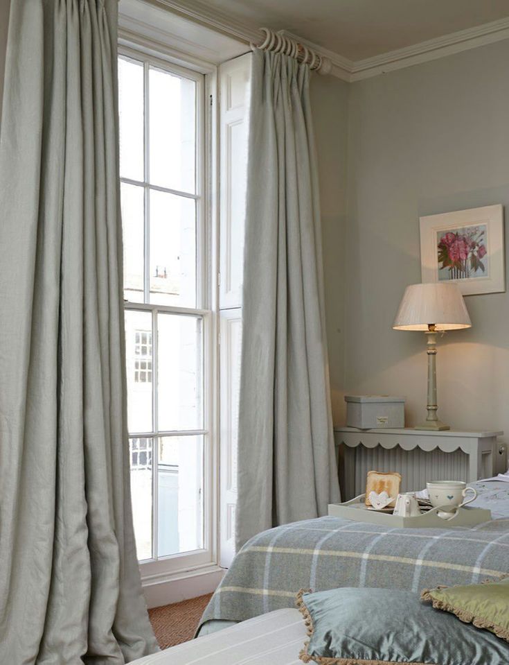 Vivid Blue Curtains in a Stylish Bedroom