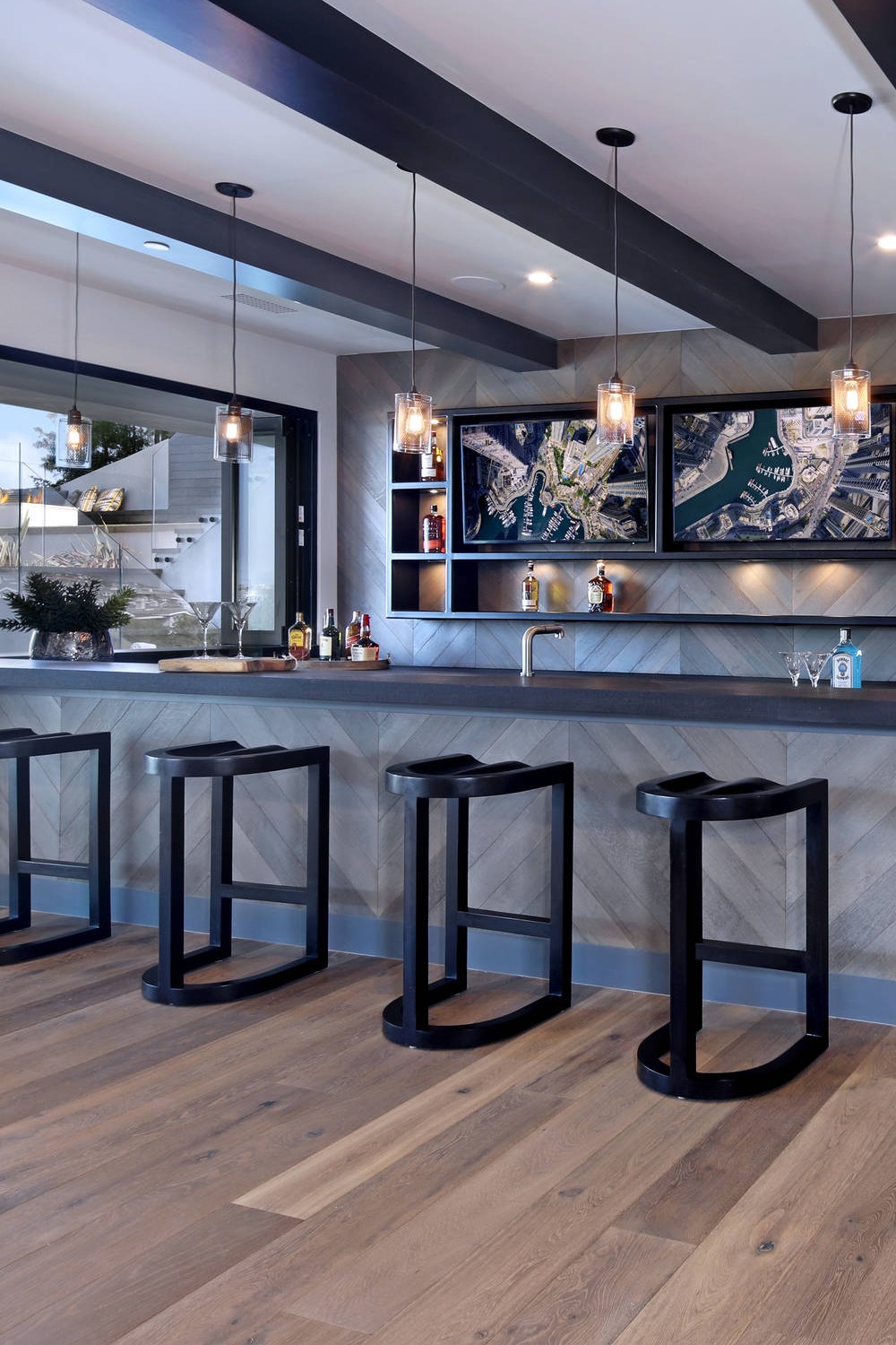 Basement Bar in Neutral Tones with Modern Streamlined Design