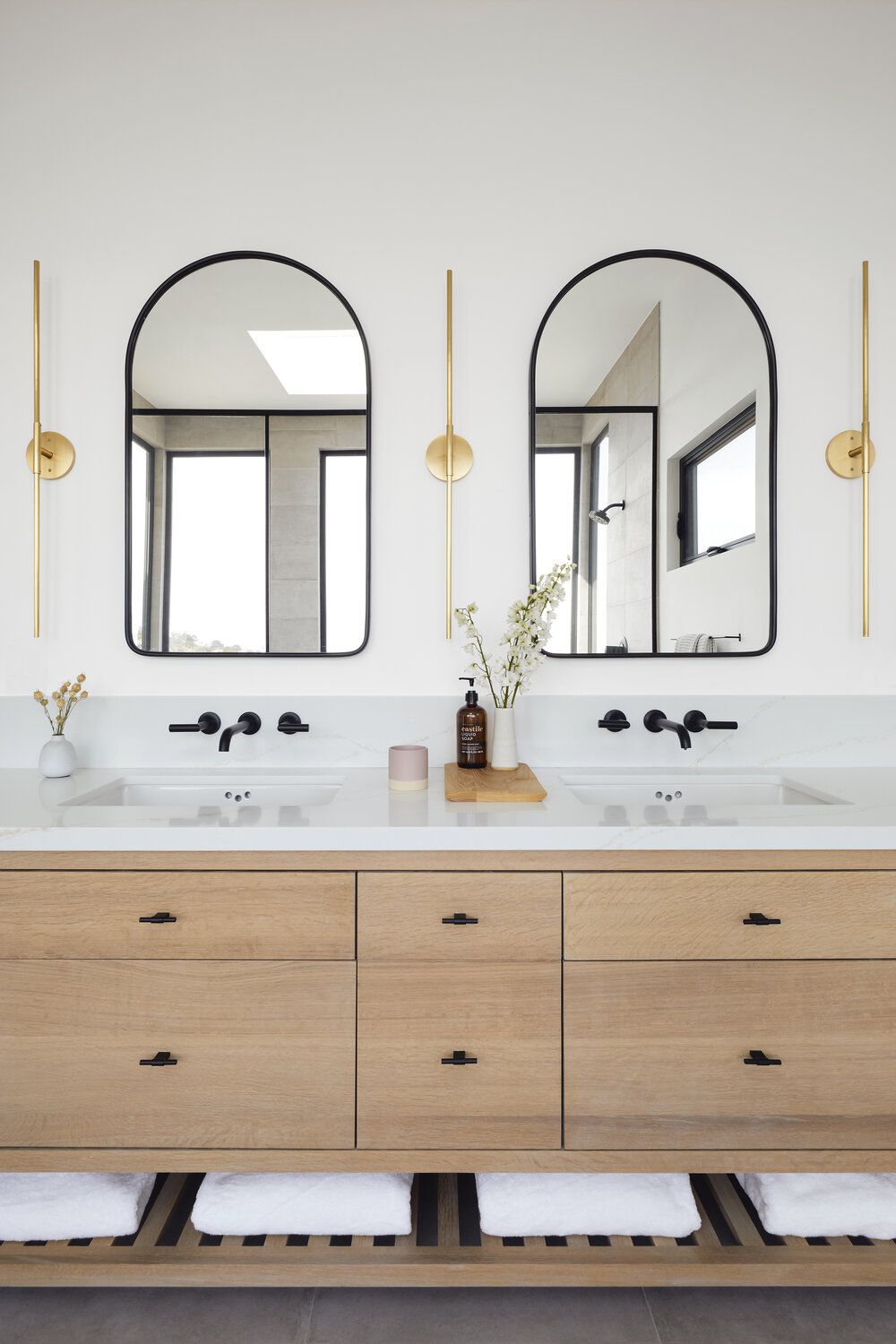 Modern Farmhouse Bathroom with Black Vanity and Natural Wood Accents