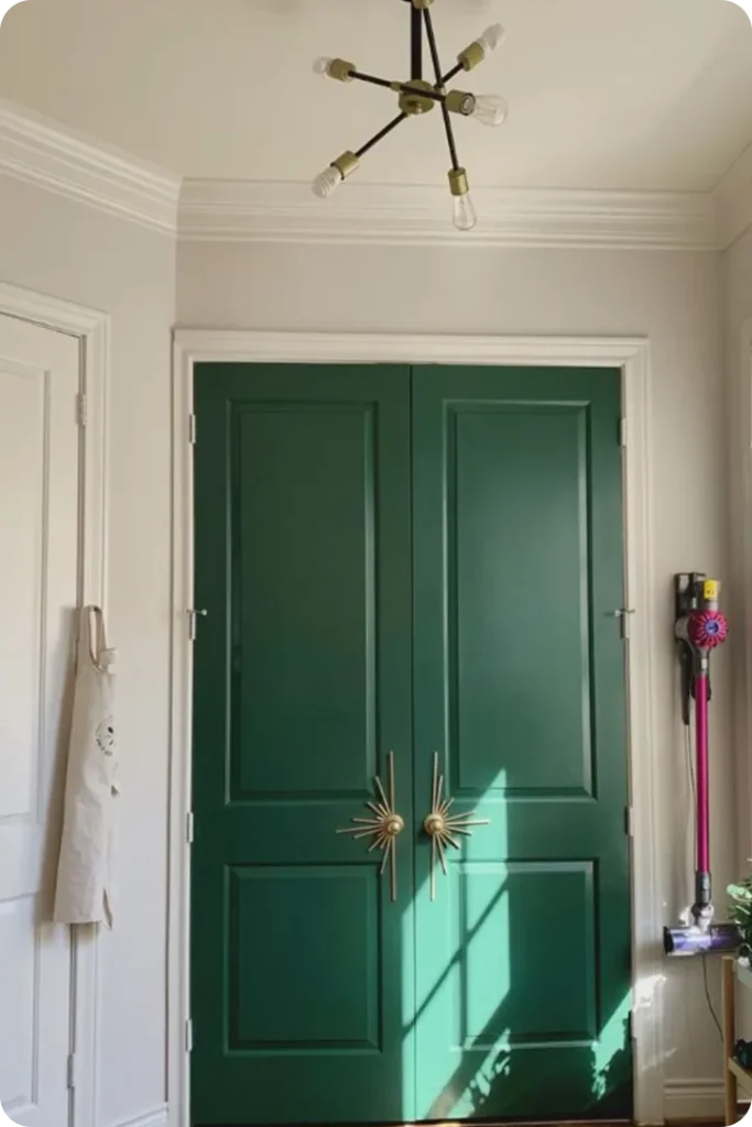 Forest Green Door Framed with Muted Cream Walls