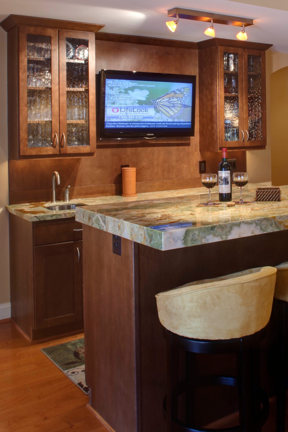 Transitional Basement Bar with Light Wood and Quartz Countertops
