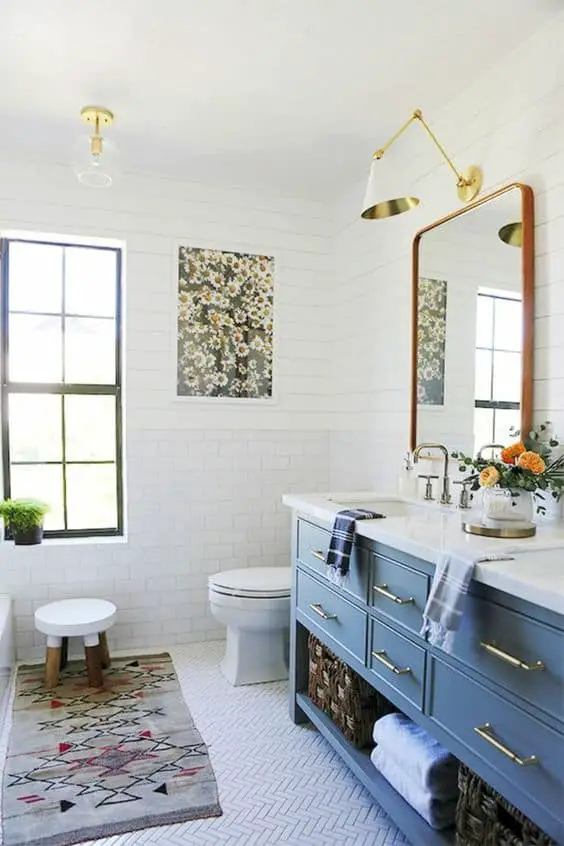 Bathroom with a Bold Framed Photo on White Walls