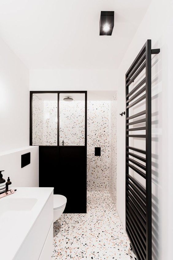 Striking Black and White Bathroom with Space Divider