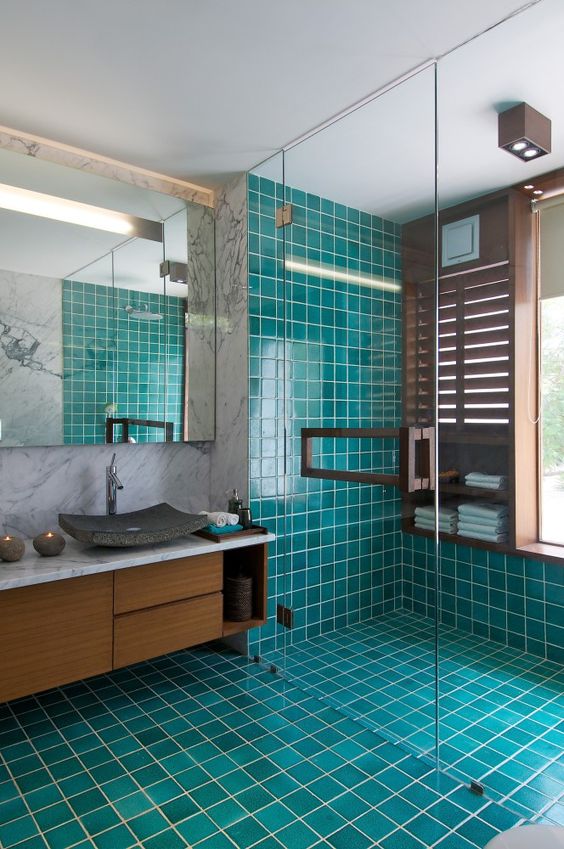 Modern Bathroom with Bright Turquoise Tiles and Marble Accents