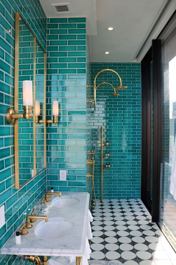 Chic Bathroom with Turquoise Tiles and Gold Fixtures
