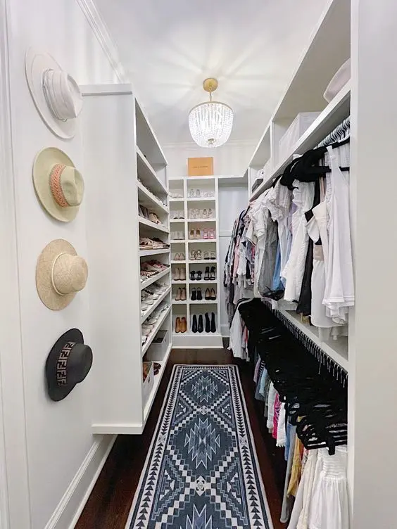 Sleek White Walk-In Closet with Shoe Focus