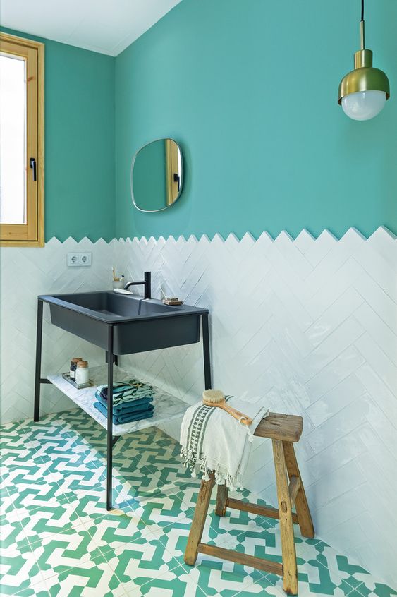 Bathroom with Turquoise Walls, Navy Sink, and Wooden Accents