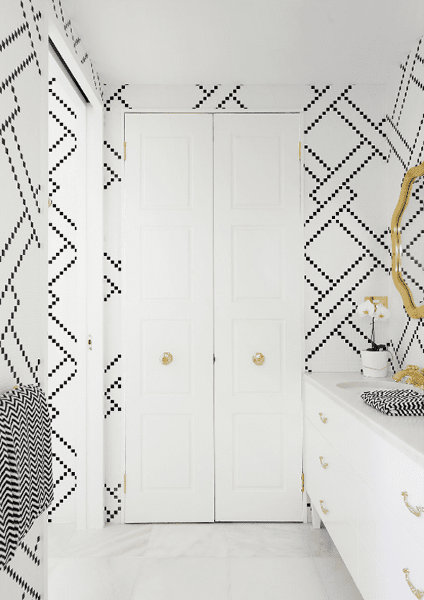 Elegant Bathroom with Luxurious Black Fixtures and Marbled Walls