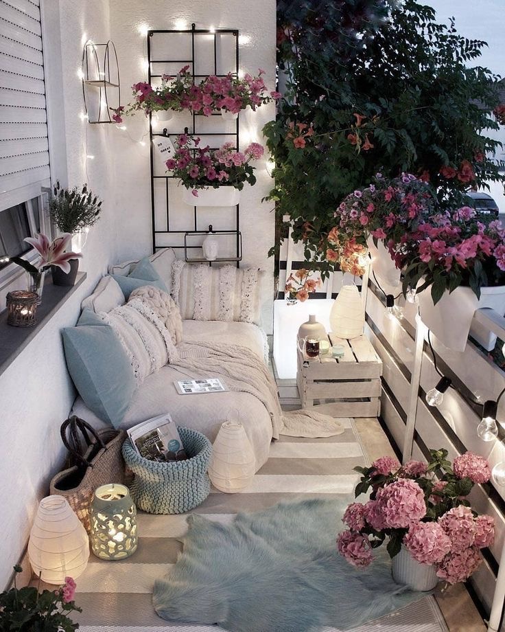 Chic Urban Balcony with Cushioned Seating