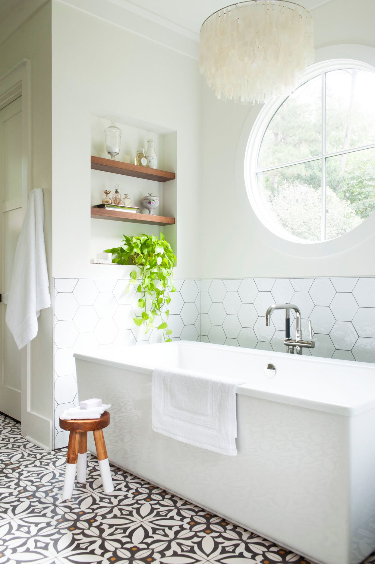 Classic White Bathroom with Bold Patterned Floor Tiles