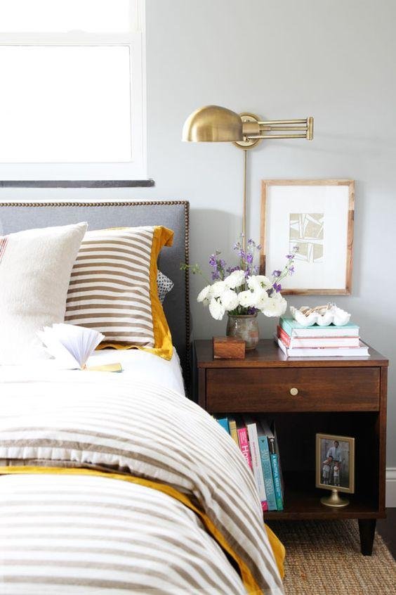 Minimalist Sconces in a Compact Bedroom