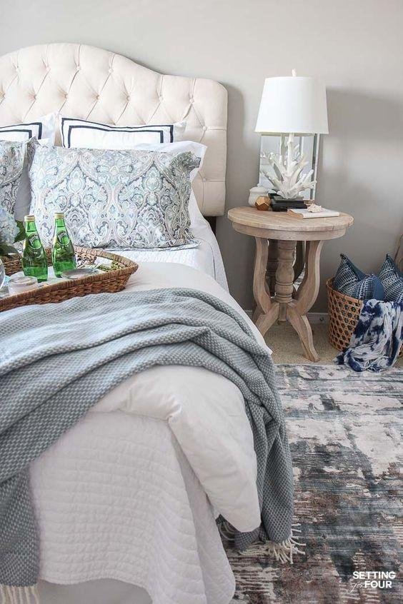 Bedroom with Rugs and Soft Neutral Curtains