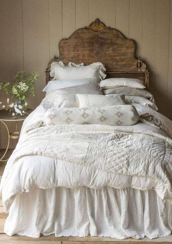 French Country-inspired Bed with Ruffled Floral Pillows