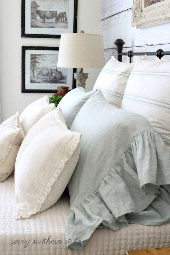 Classic French Bedroom with Ornate Pillows and Soft Tones