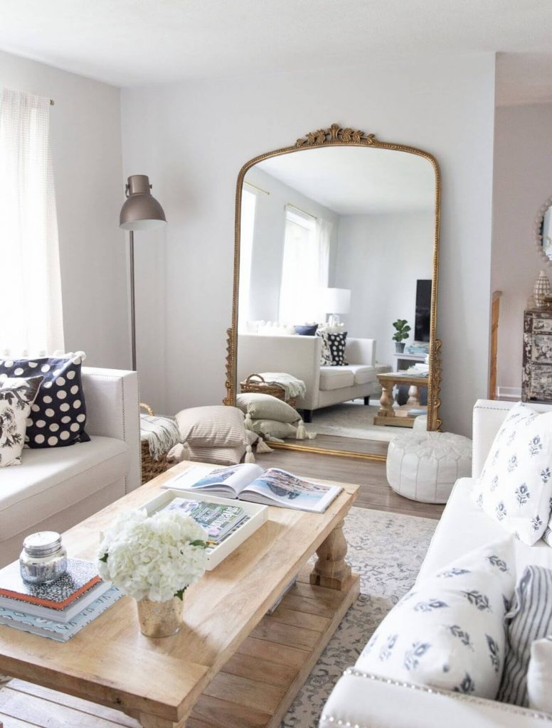 Gleaming Primrose Mirror with a Touch of Drama