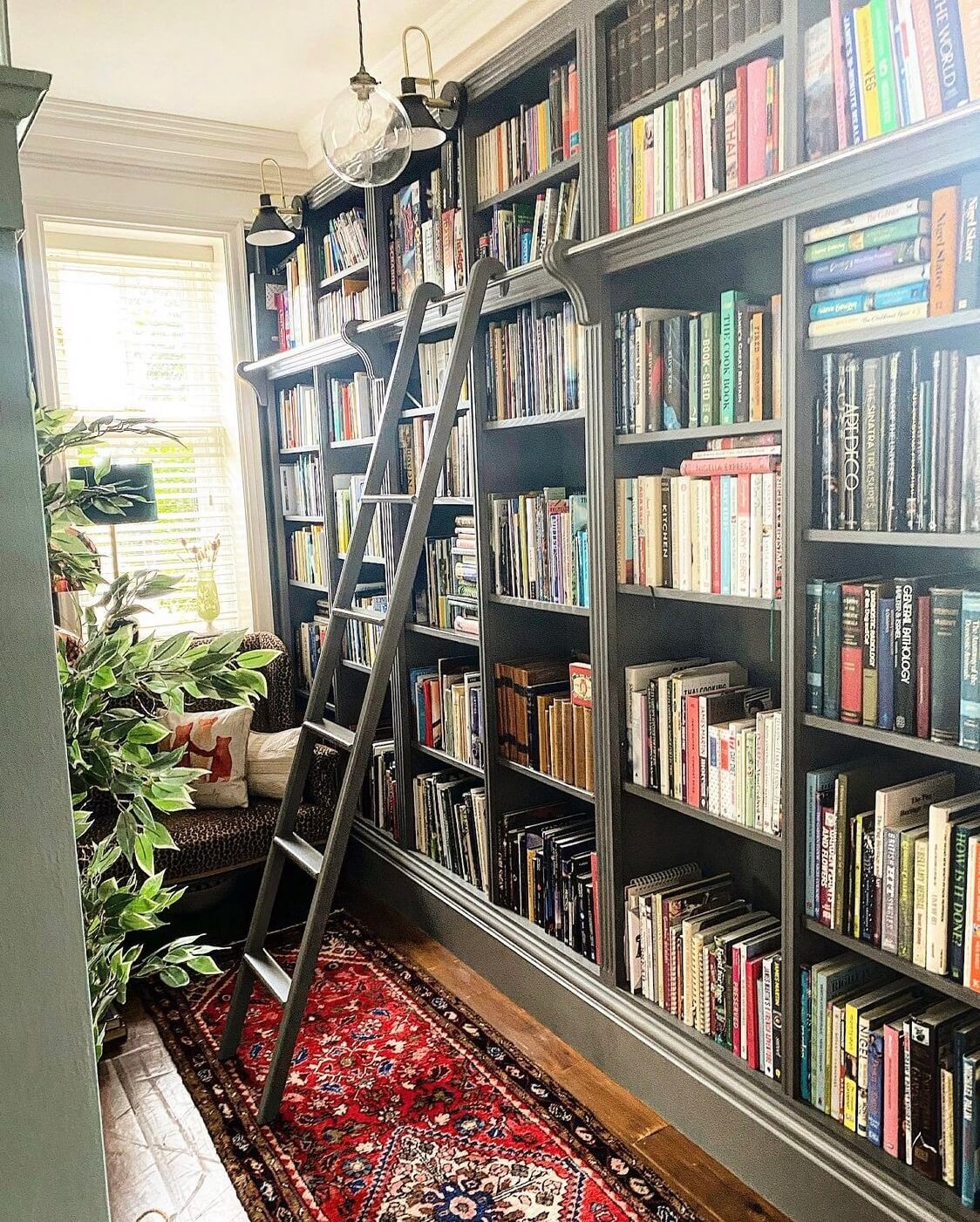 Charming Green-Toned Reading Nook with a Window Seat