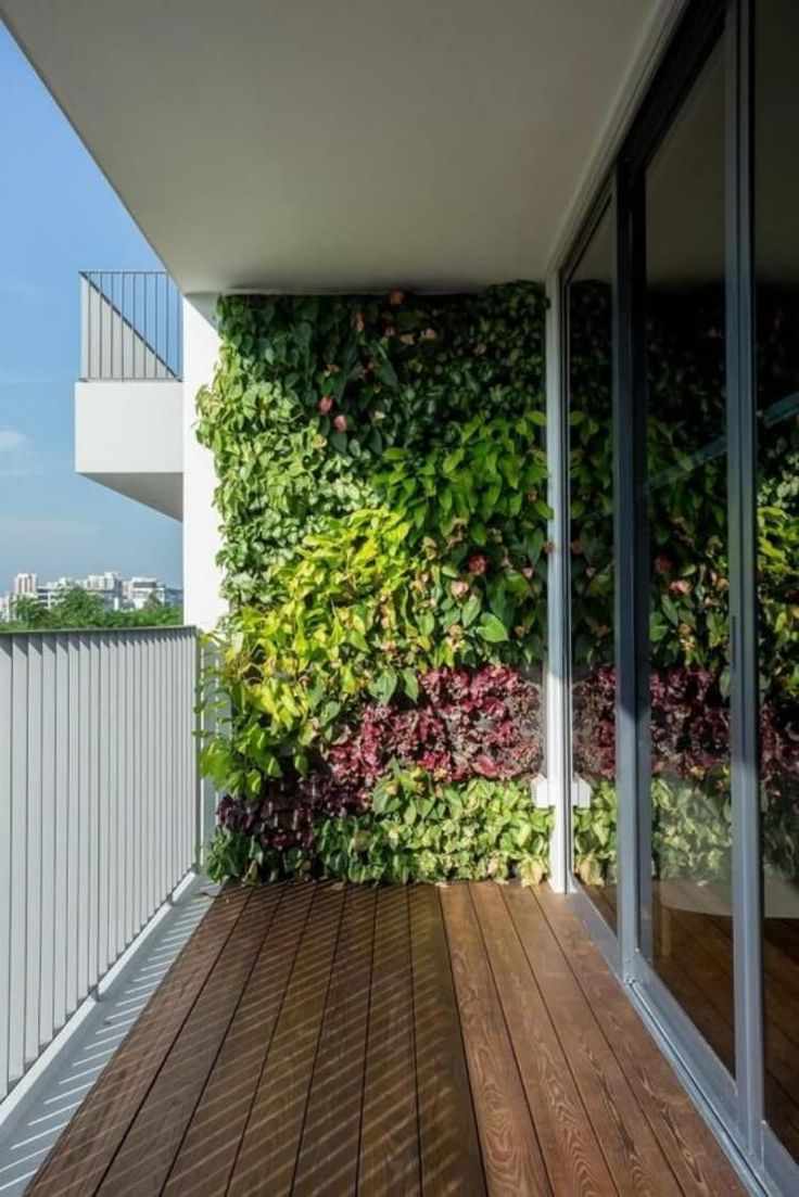 Vertical Garden on Balcony with Wooden and Metal Details