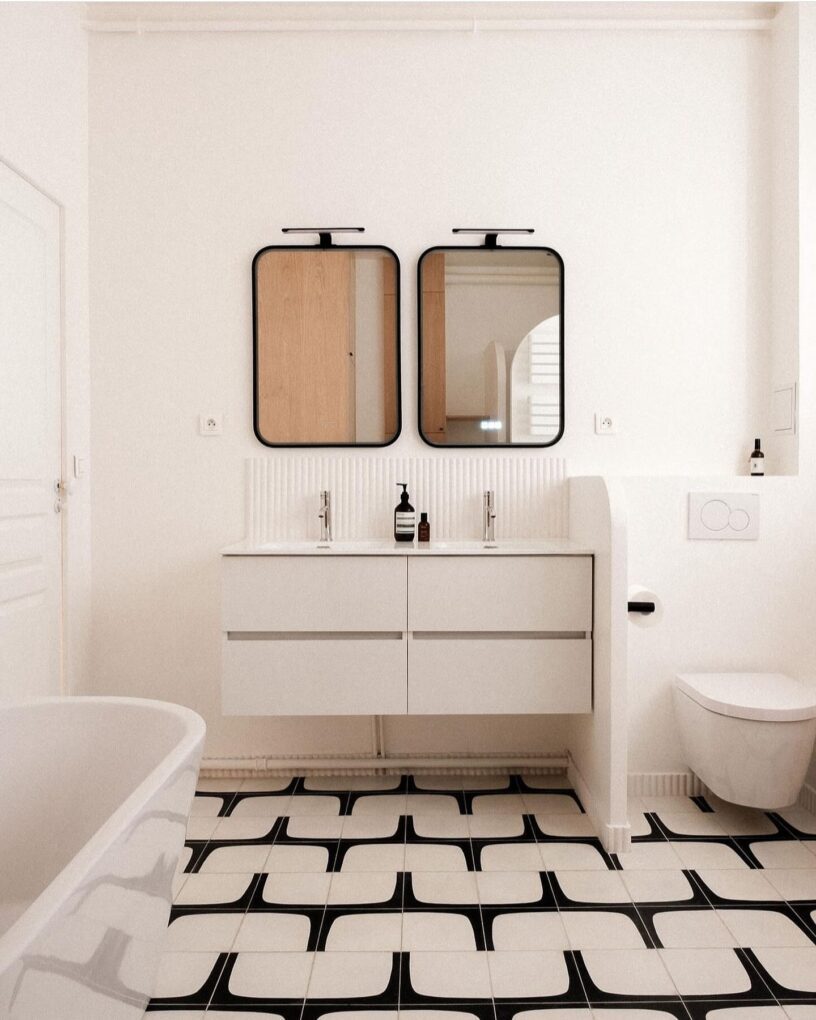 Serene Sophistication with Pale Gray Herringbone Tiles