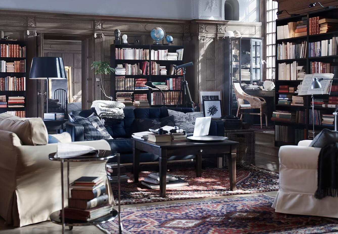 Modern Scandinavian Attic Library with Blue Sofa