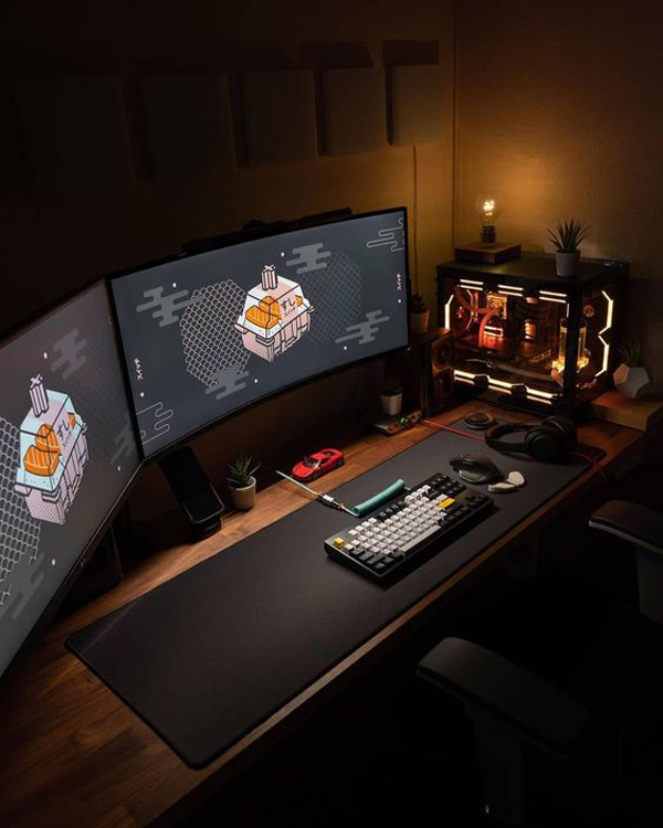 The Lords of the Gaming Desk Setup with Wooden Accents