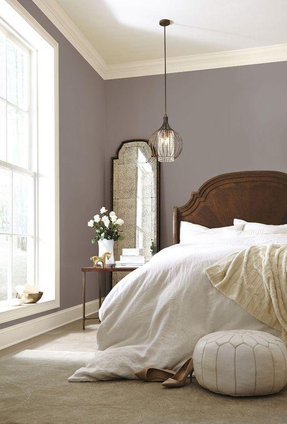 Bedroom with Neutral Curtains and Bedding