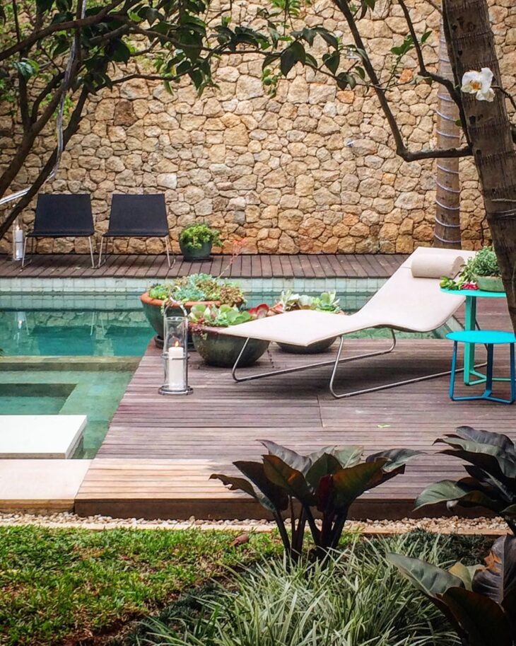 Rustic Pool Design with Verdant Surroundings
