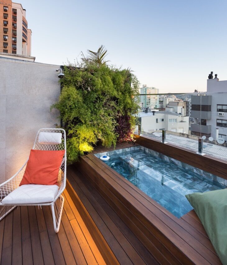 Rustic Backyard Pool with Wood-Centric Design